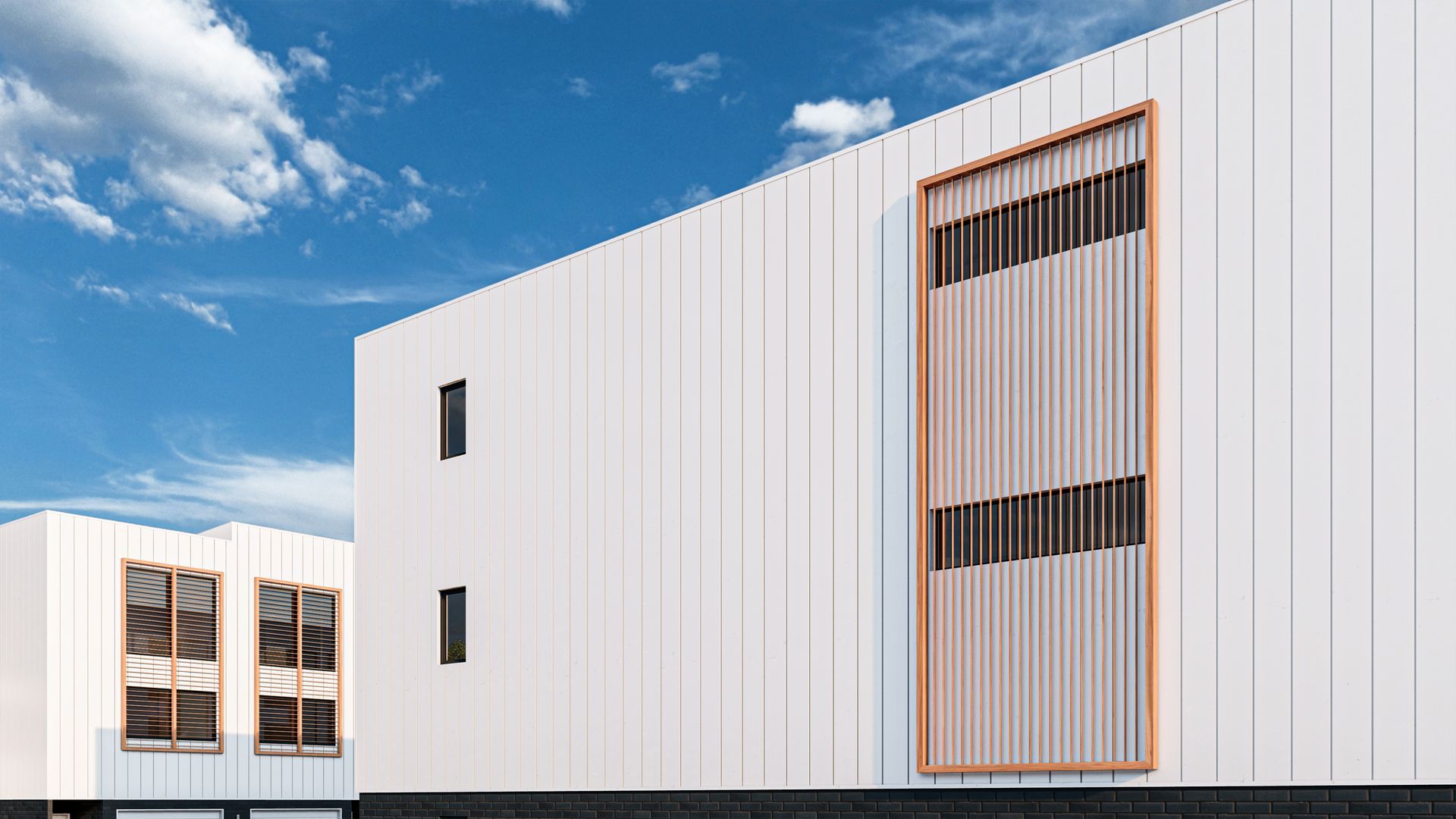 White building with vertical lines, brown wood accent, and small black windows. Blue sky background.