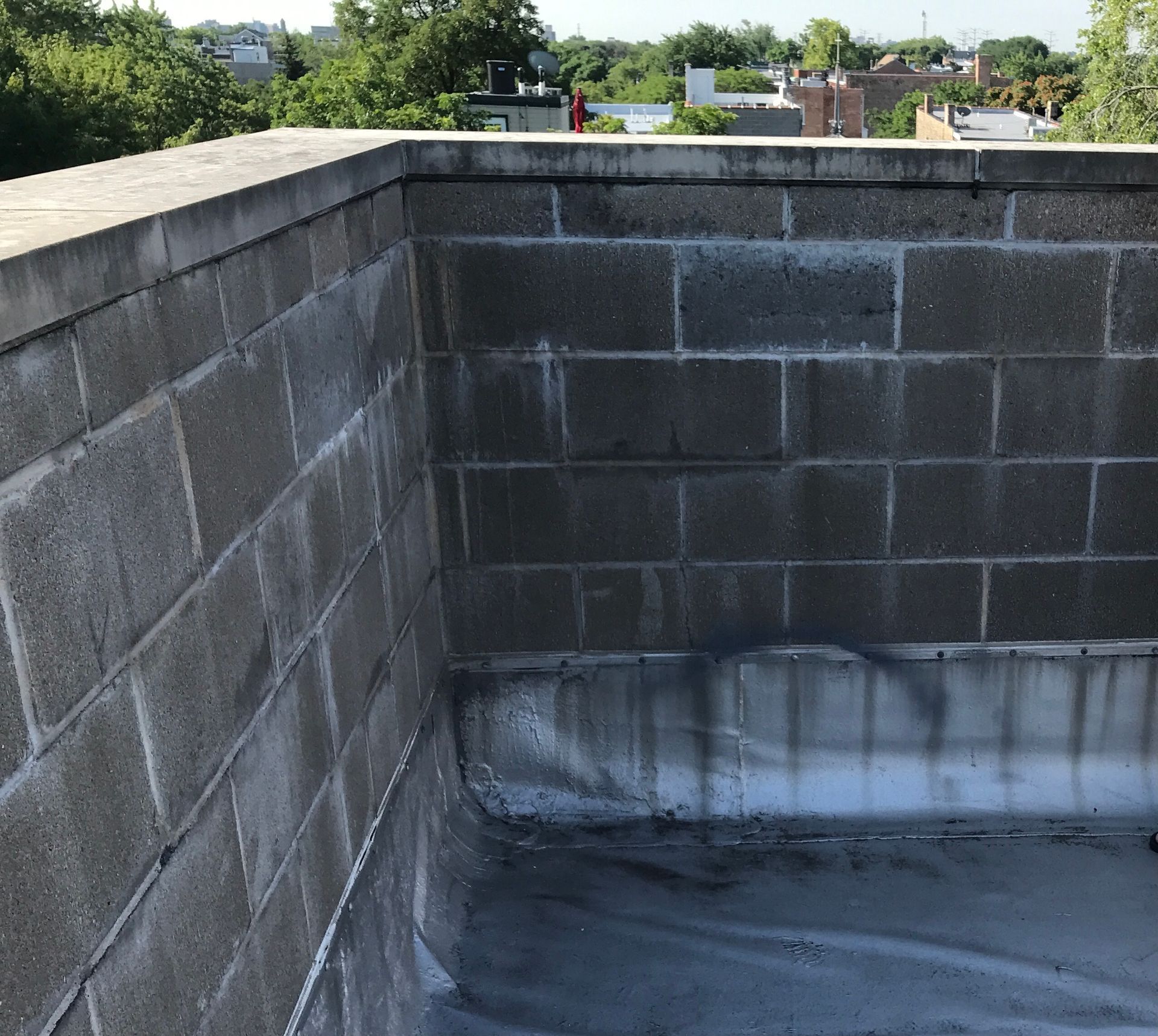 Wet concrete mansonry unit parapet, Wicker Park, Chicago