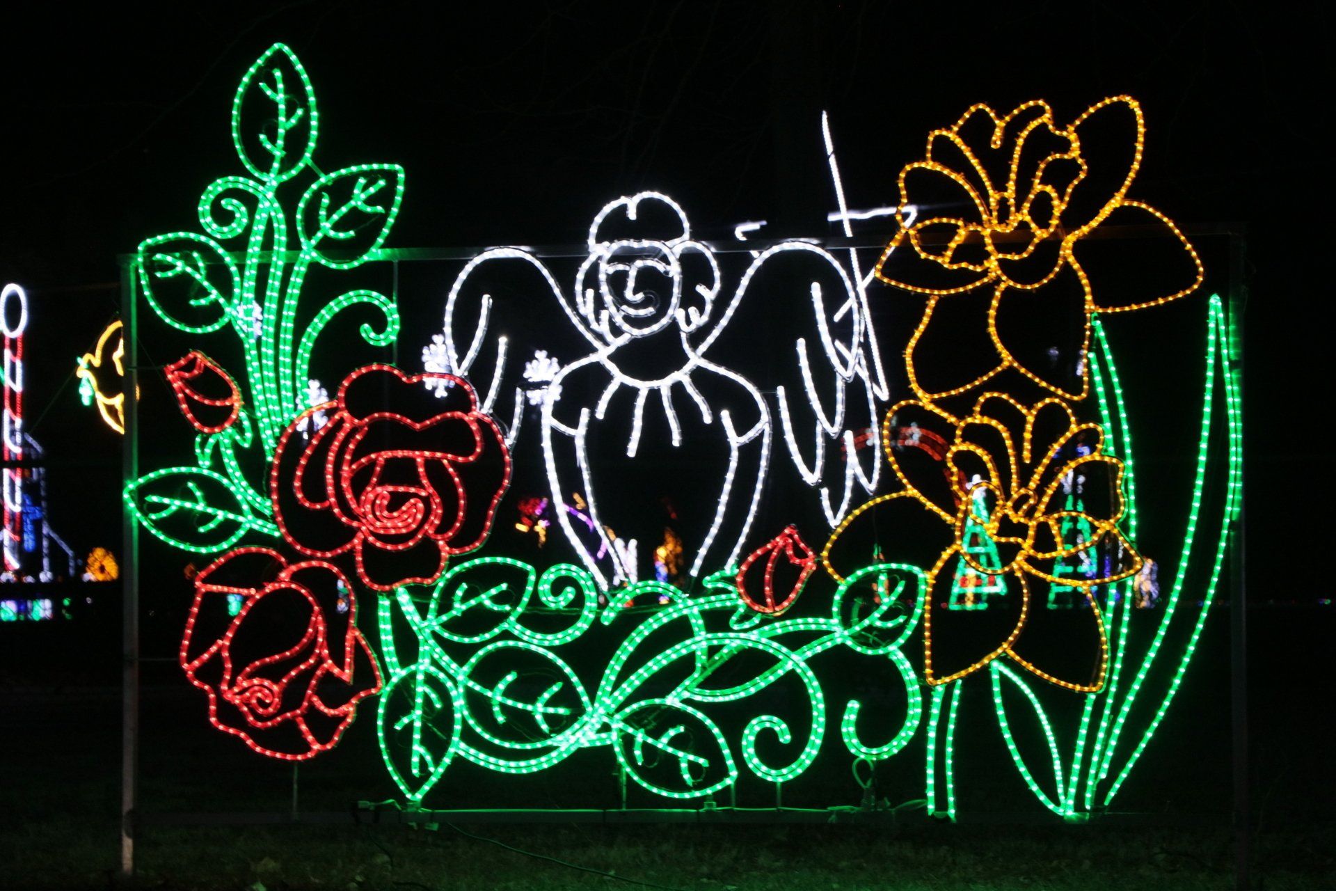 Angel surrounded by flowers.