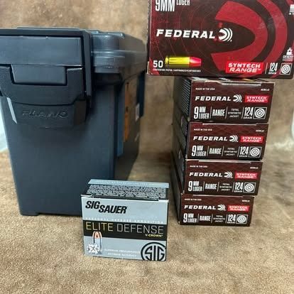 Ammunition storage and 9mm rounds, including SIG Sauer Elite Defense and Federal Syntech.