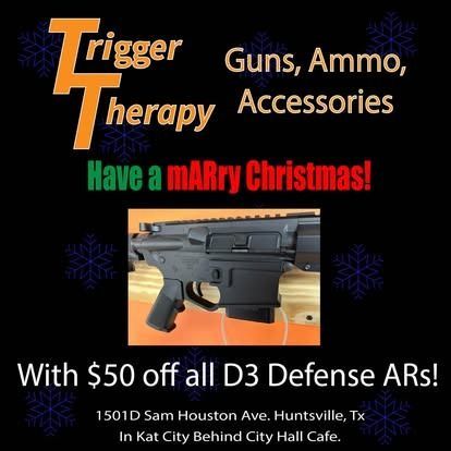 Advertisement for Trigger Therapy, a gun store, offering $50 off D3 Defense ARs. Features a gun, Christmas greeting, and address.