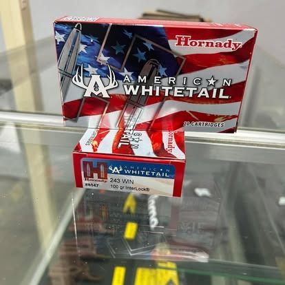 Box of Hornady American Whitetail .243 WIN ammunition with American flag design.