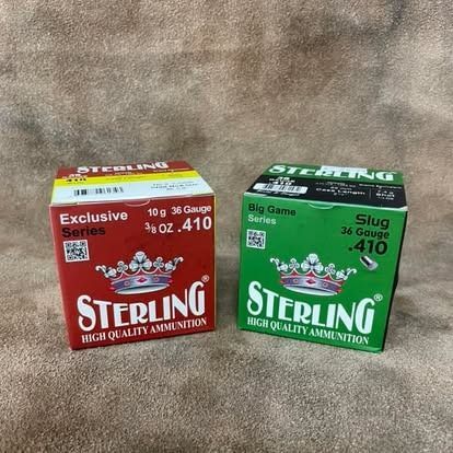 Two boxes of Sterling .410 gauge shotgun shells: red 