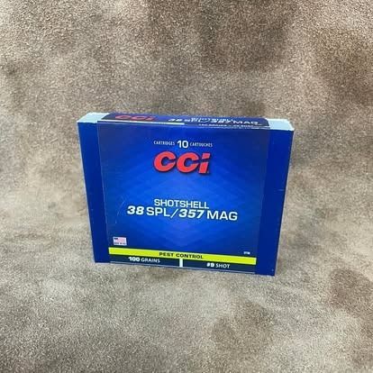 Box of CCI shotshell ammunition, blue with red and white text, on a brown surface.