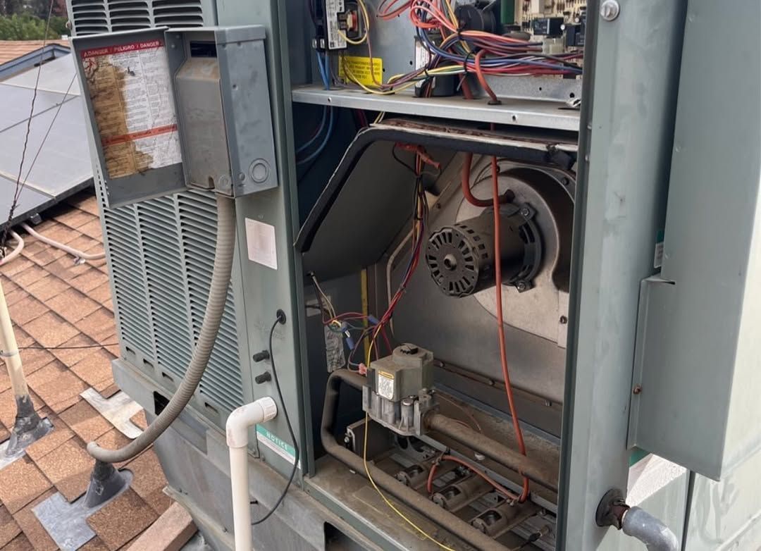 The inside of an air conditioner is shown with the door open.