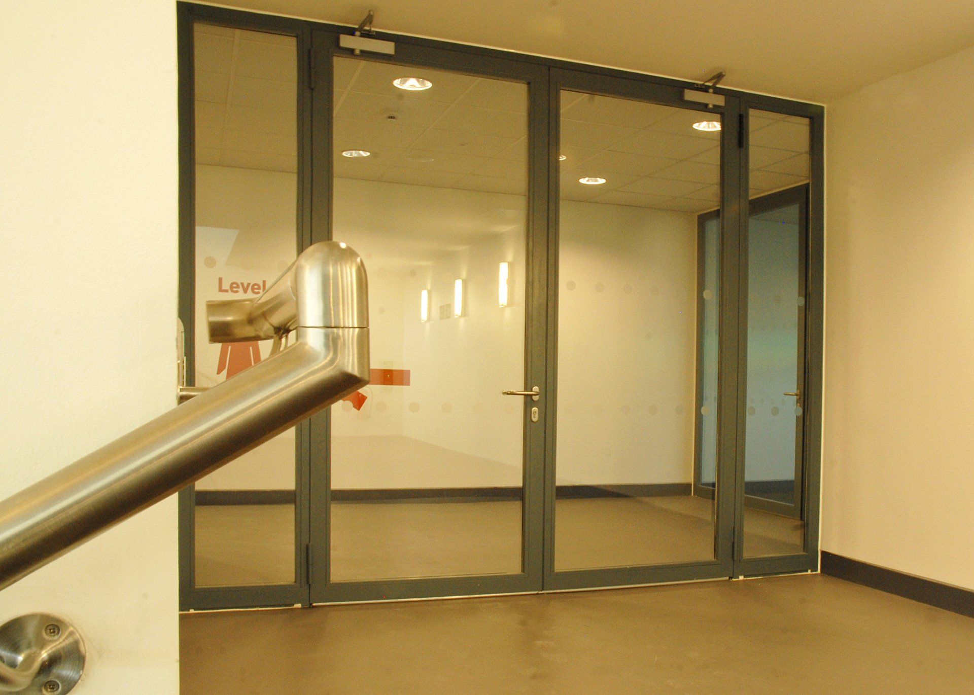 Fire resistant glass door