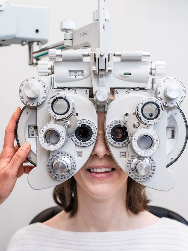 eye exam equipment on lady