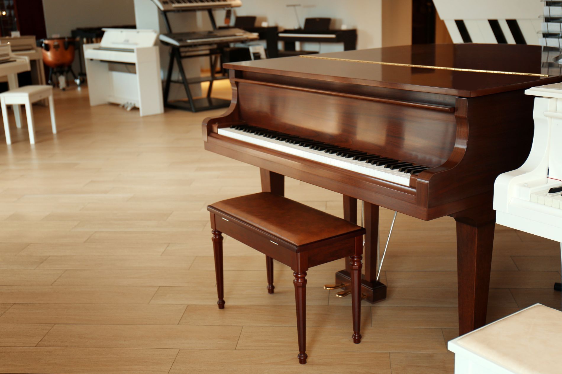 brown baby grand piano