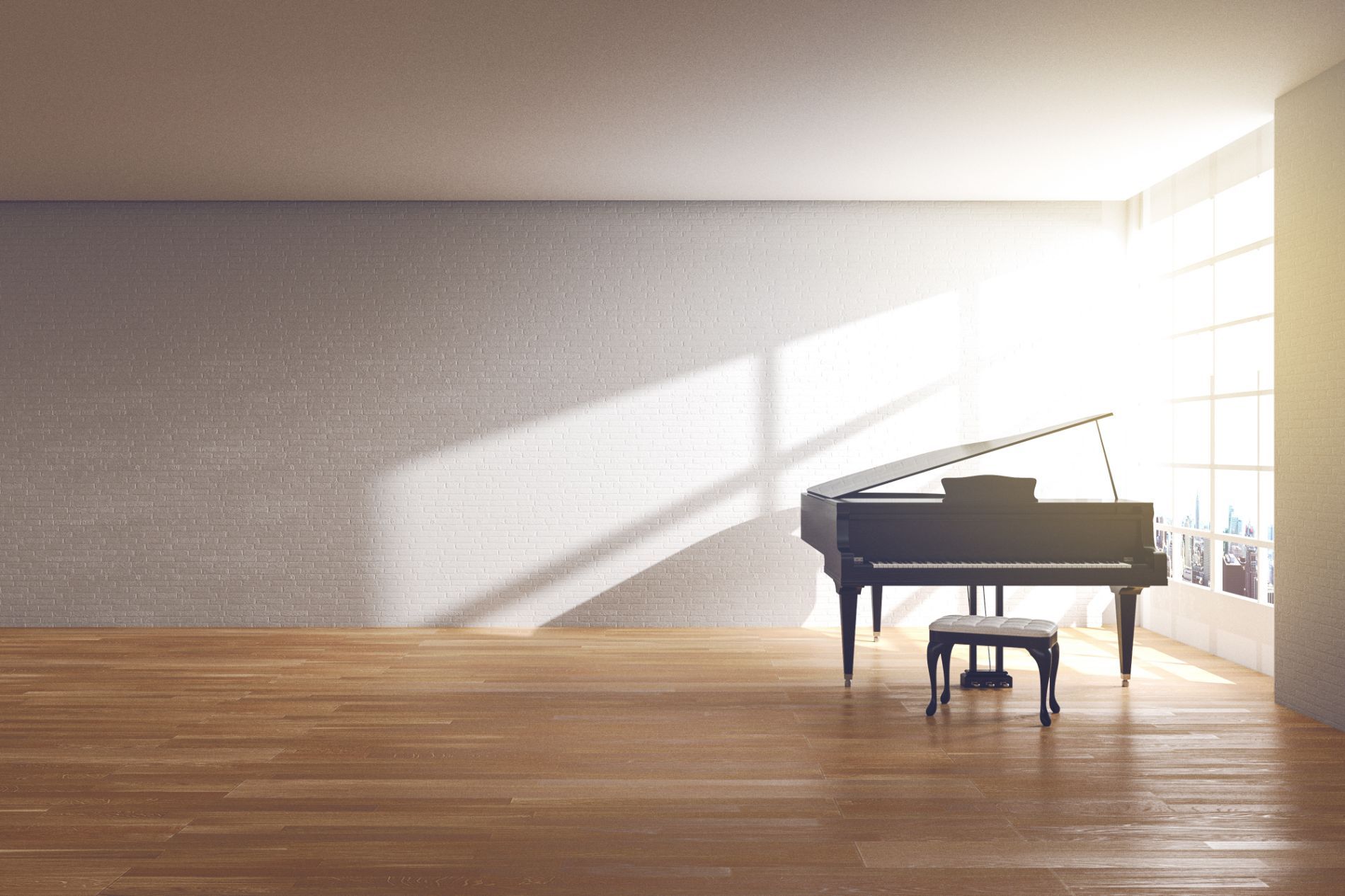 baby grand piano in empty room