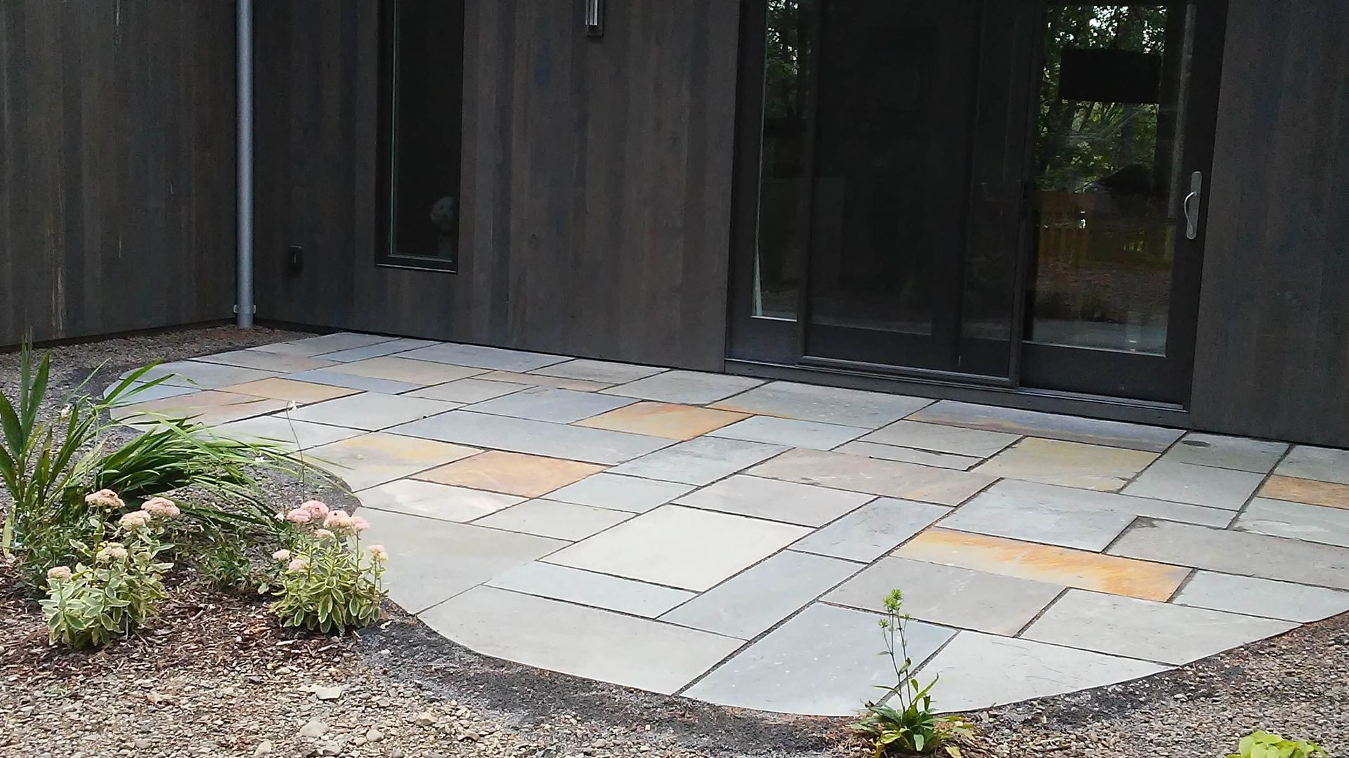 An aerial view of a stone walkway in a garden.