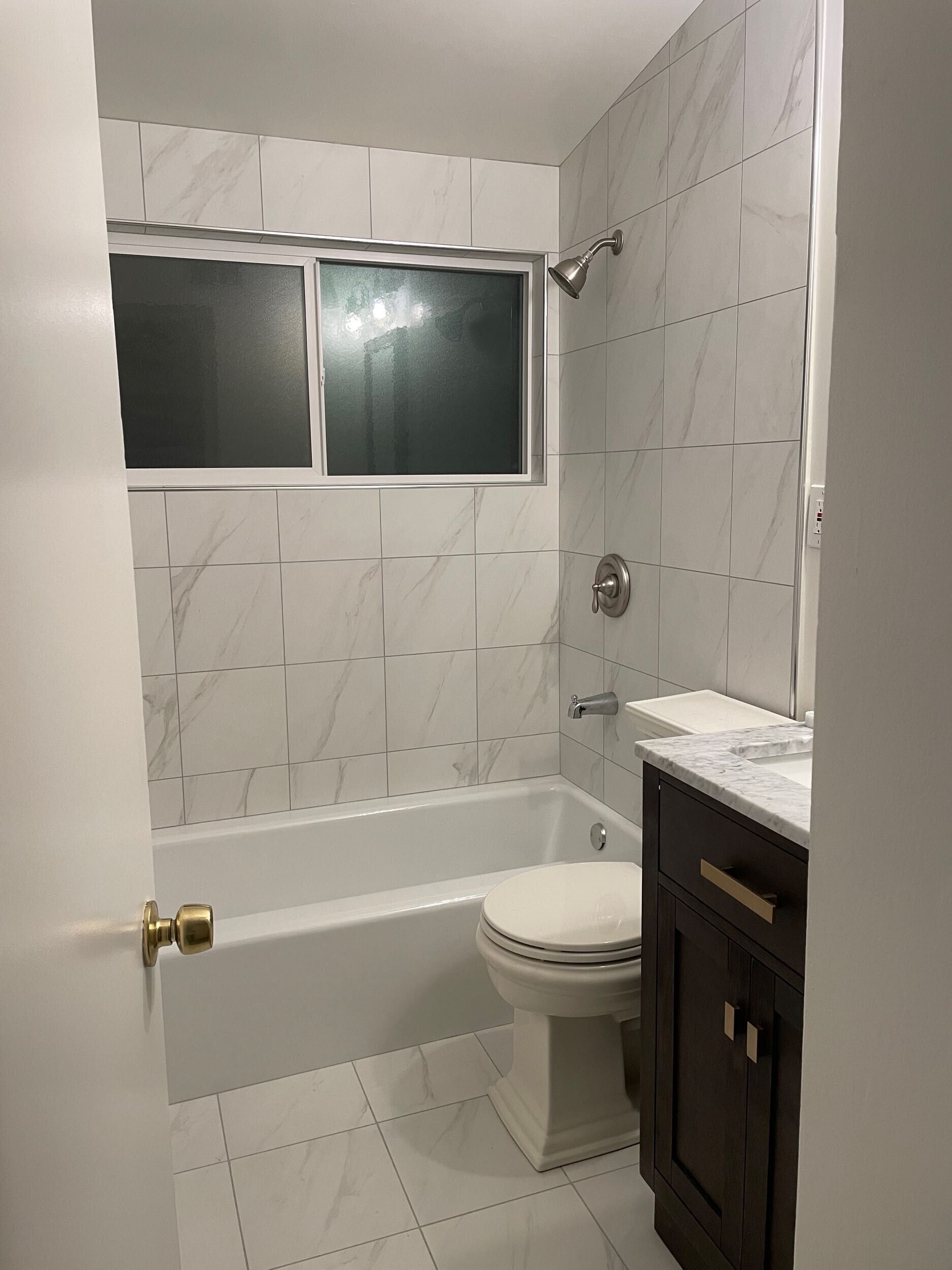 Dream Build Services recently completed an accessible bathroom renovation in the Bay Area, transforming an outdated and narrow layout into a modern, mobility-friendly space. The remodel features a spacious walk-in shower with grab bars, a built-in bench, modern lighting, and sleek tile design. Ideal for aging-in-place, senior accessibility, and improved home safety.