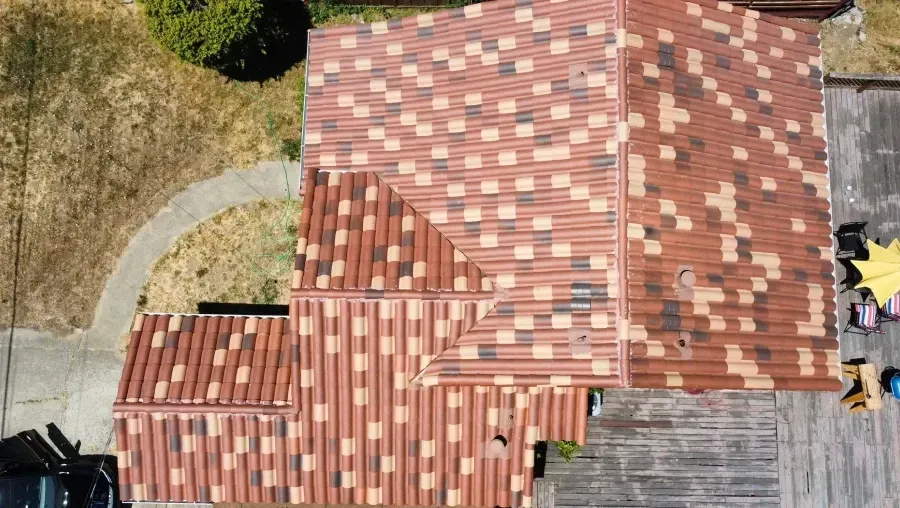 An aerial view of a house with a tiled roof.