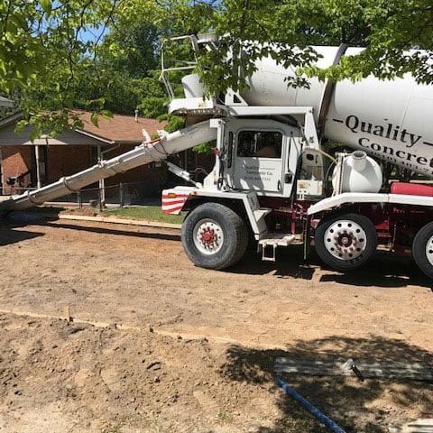 concrete workers pouring concrete
