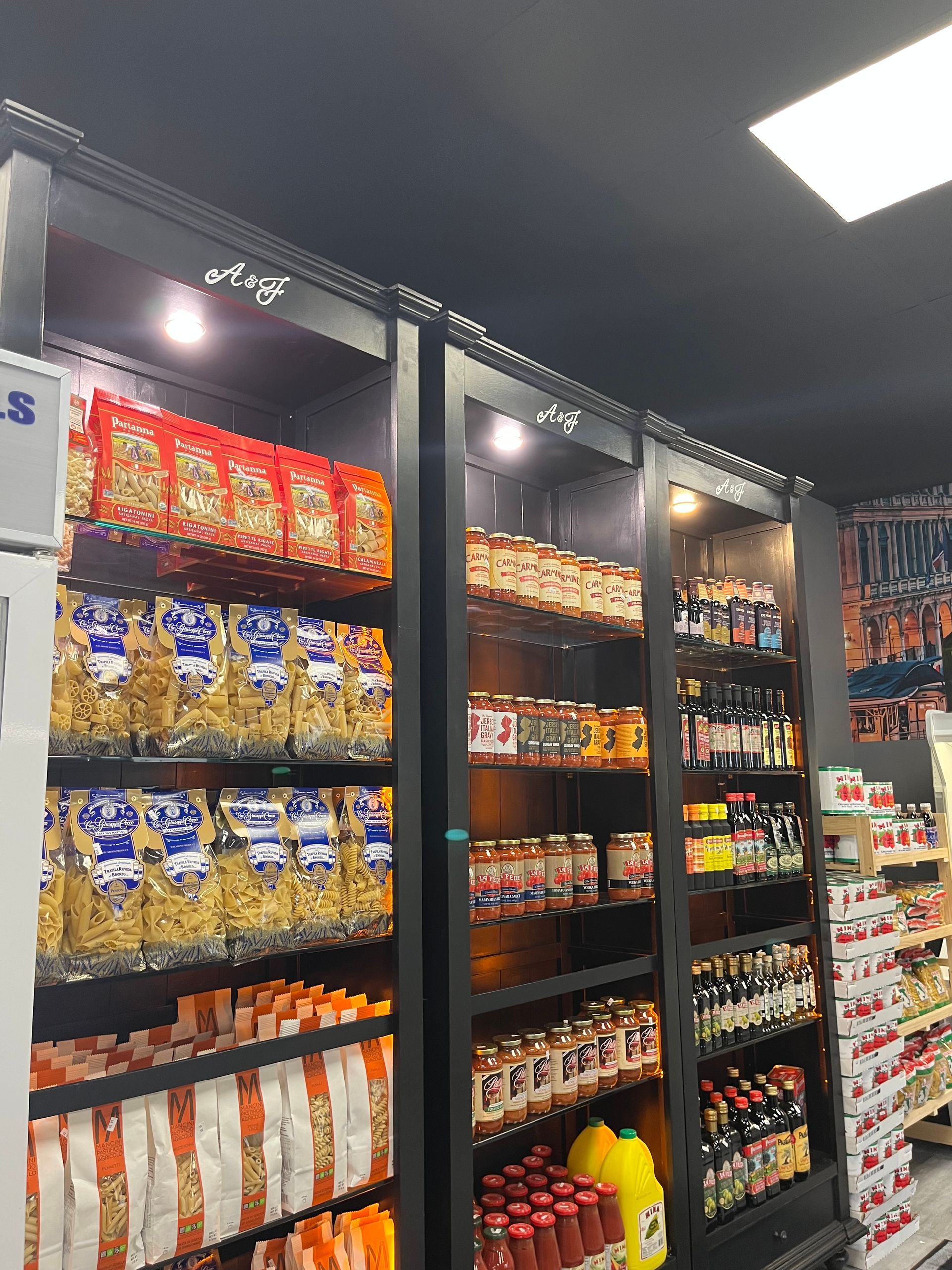 Snack aisle with shelves of assorted chips, cookies, and packaged snacks in a grocery store