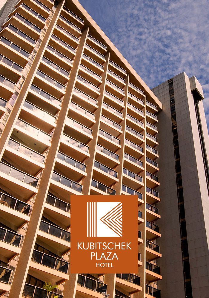 Fachada do Kubitschek Plaza Hotel com fileiras de varandas e um logotipo.