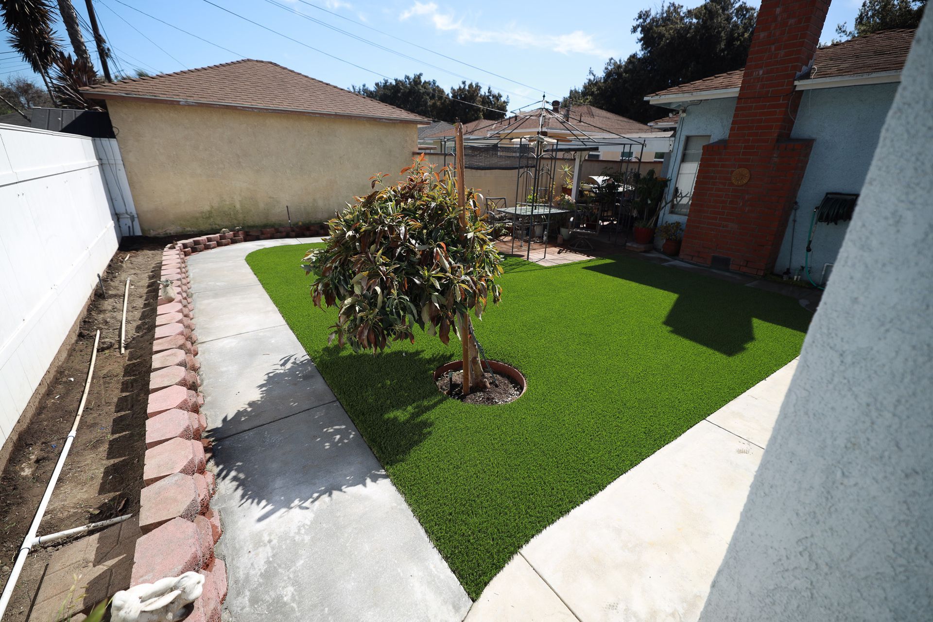 back yard after installing fake grass