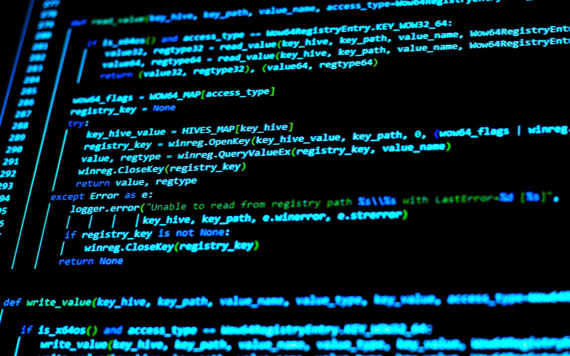 Code on a black screen; blue and white text.