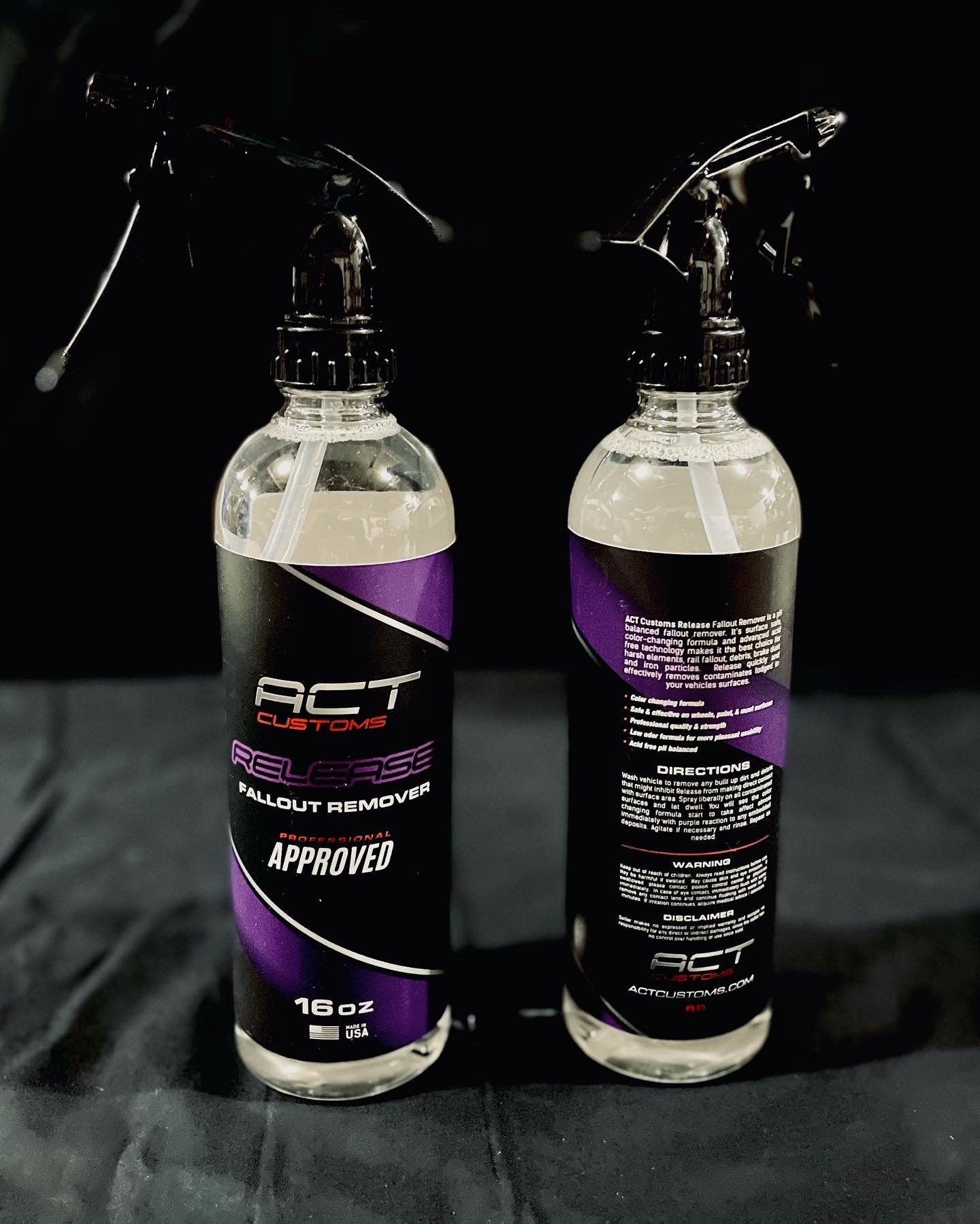 Two bottles of act approved spray sitting next to each other