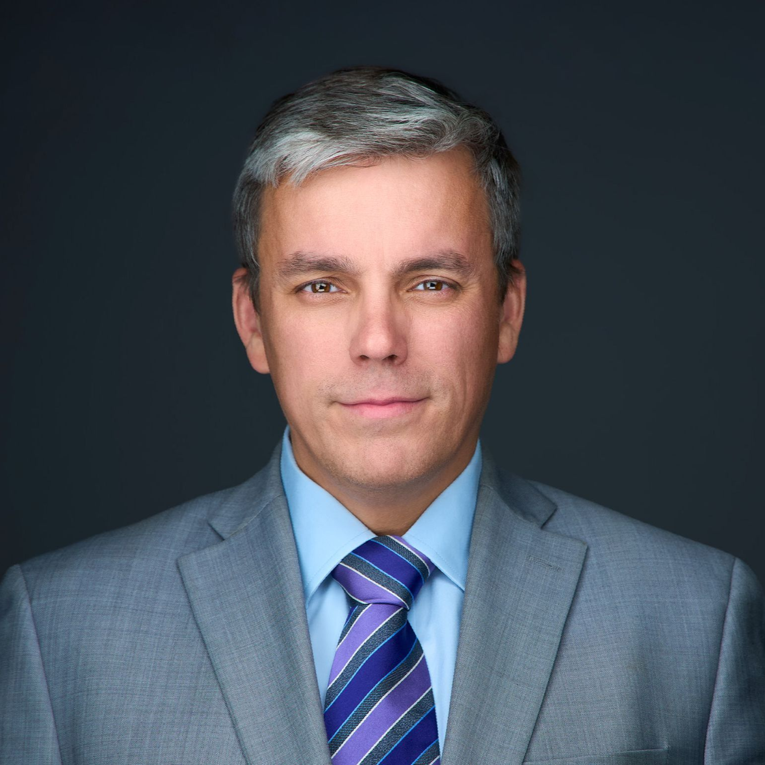 Matthew D. Gailey, Esq. A man in a suit and tie is smiling for the camera.