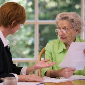 Estate Planning — Elder Meeting Up With Her Lawyer in Fayetteville, AR