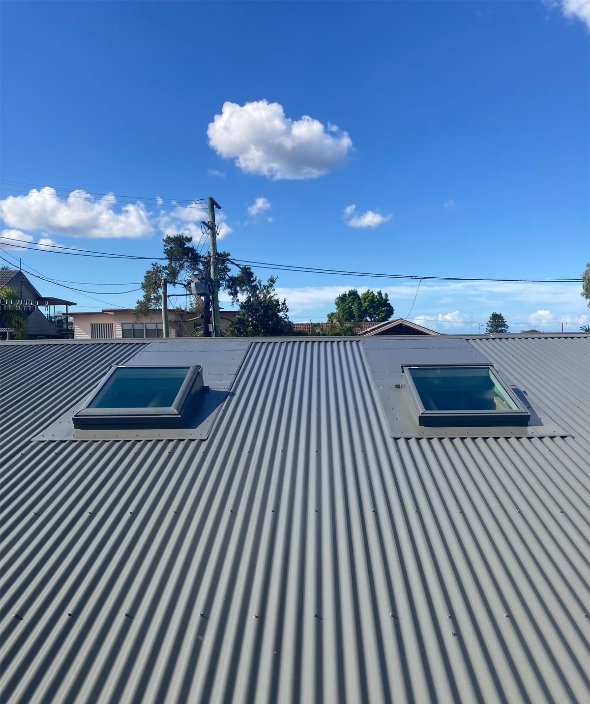 Two installed skylights on sloping roof — AG Skylights in Central Coast, NSW