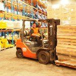 employee doing warehouse freight transportation services