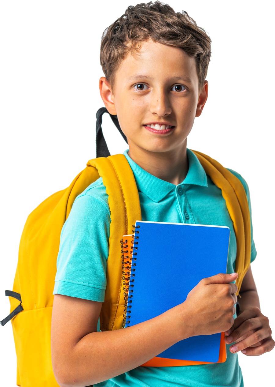 A young boy with a yellow backpack is holding a blue notebook