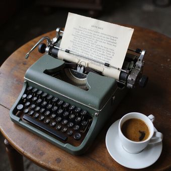 Typewriter with paper
