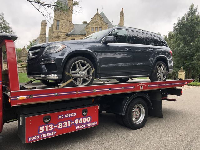 Sora's Red Towing Service Carry Car Front - Milford, OH - Sora’s Towing, Inc.