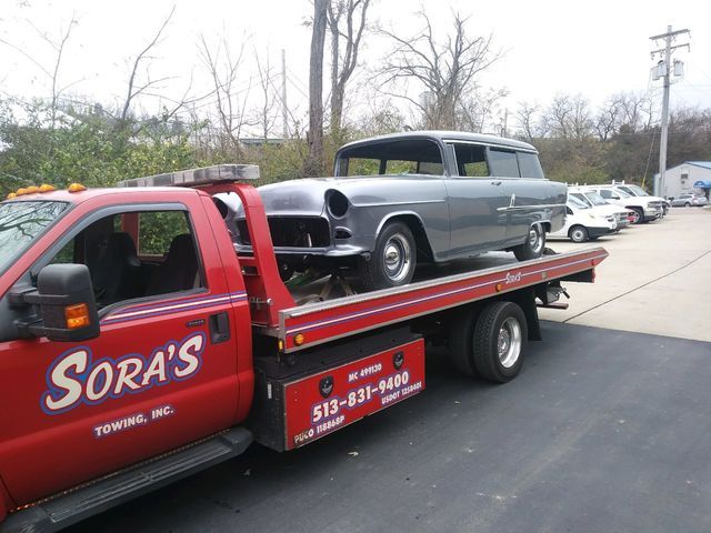 Sora's Red Towing Service Carry Car  - Milford, OH - Sora’s Towing, Inc.