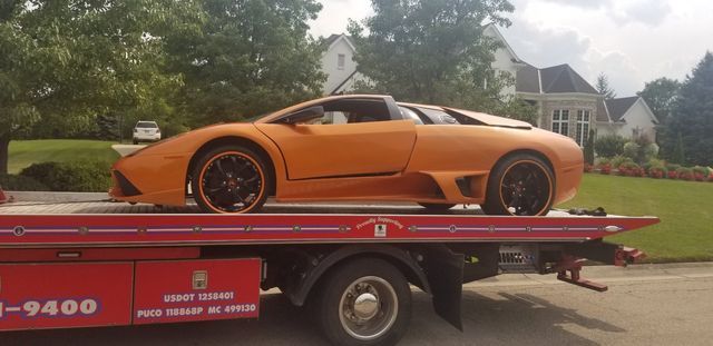 Orange Car - Milford, OH - Sora’s Towing, Inc.