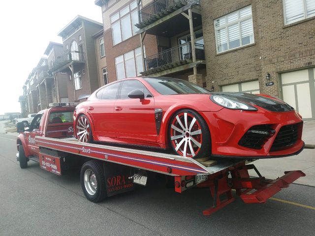 Red Car On The Way - Milford, OH - Sora’s Towing, Inc.