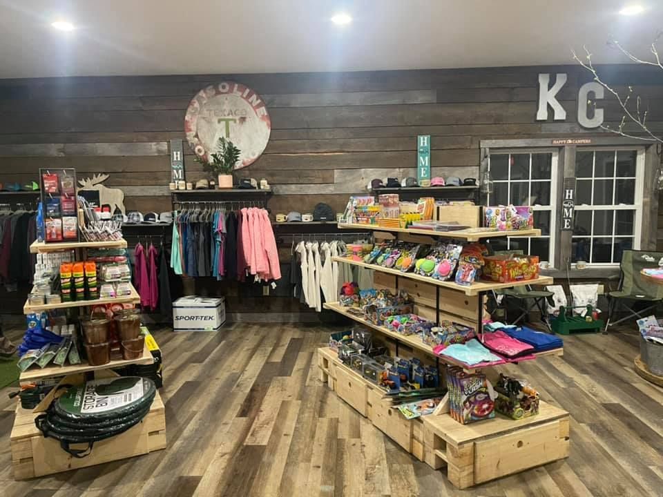 The camp store filled with lots of shelves and clothes.