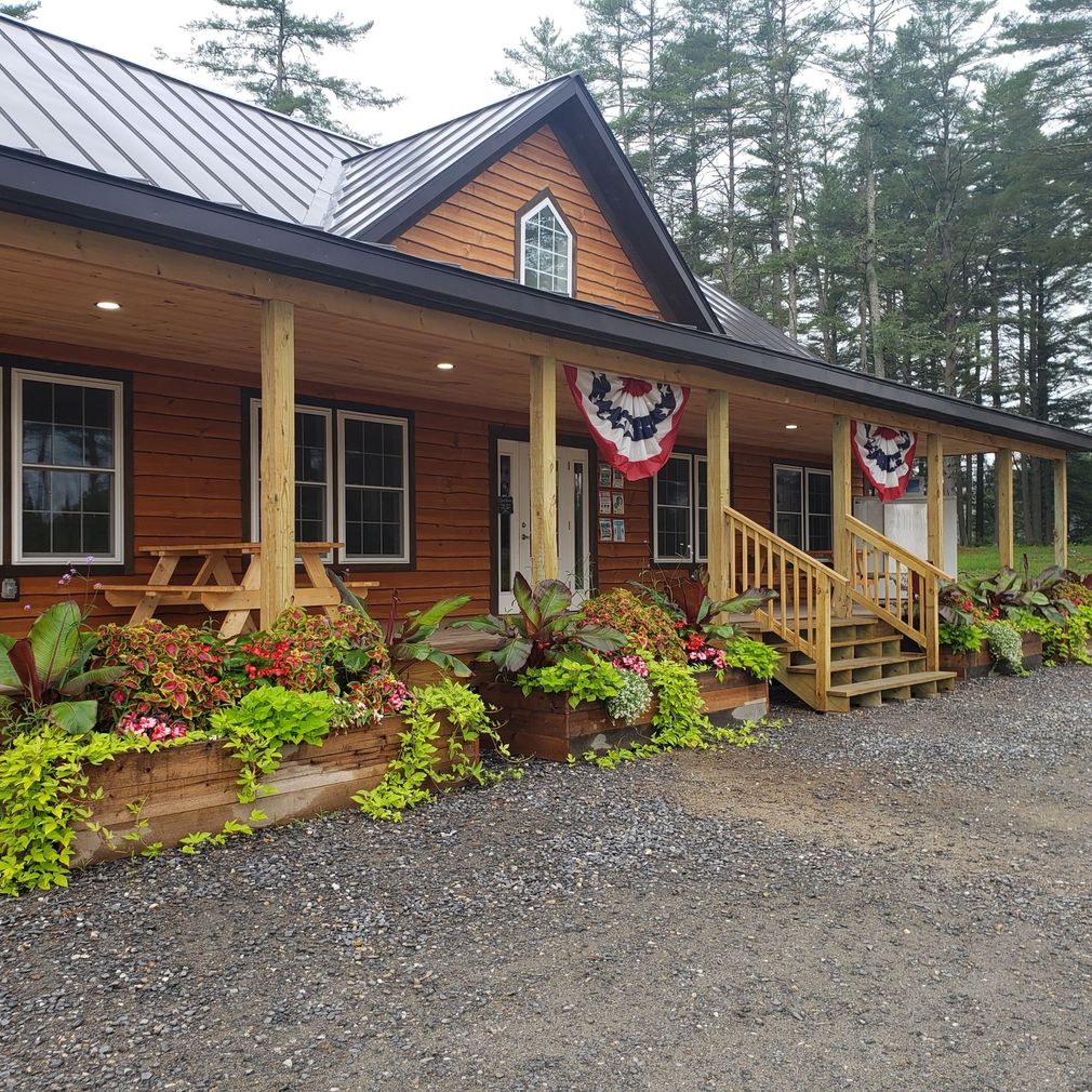 The camp store with a porch and stairs
