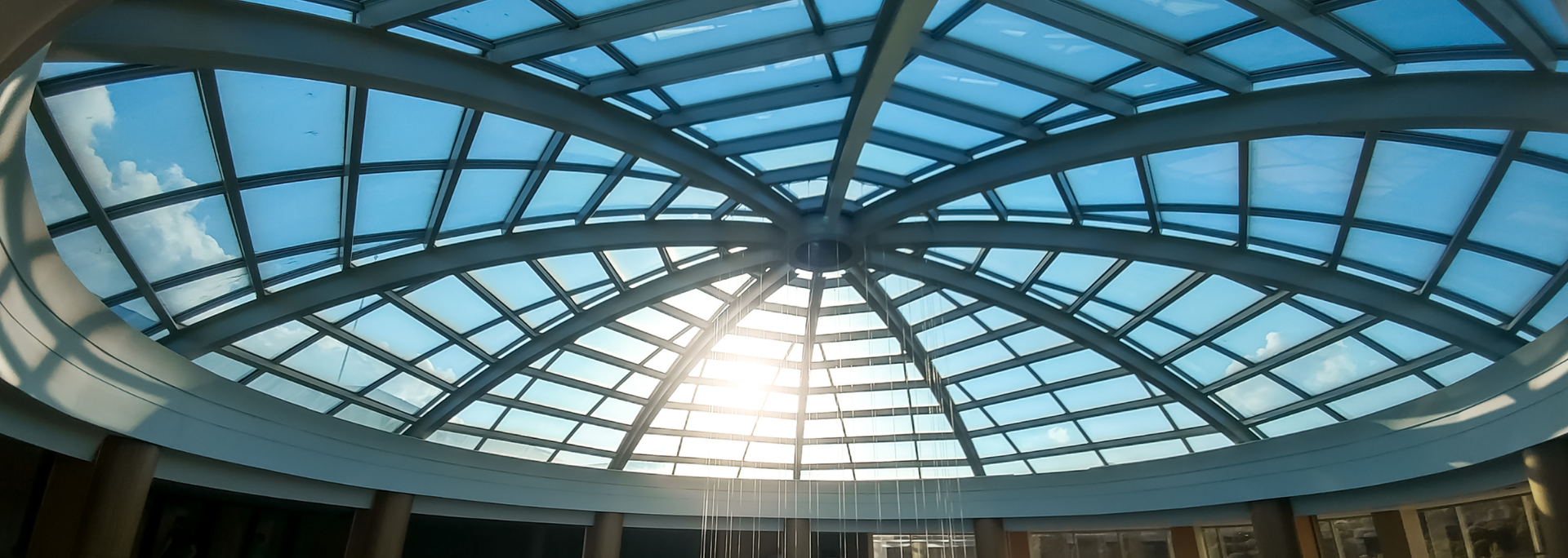 Picture of a glass roof in a business centre. Picture of a glass roof in a business centre.
