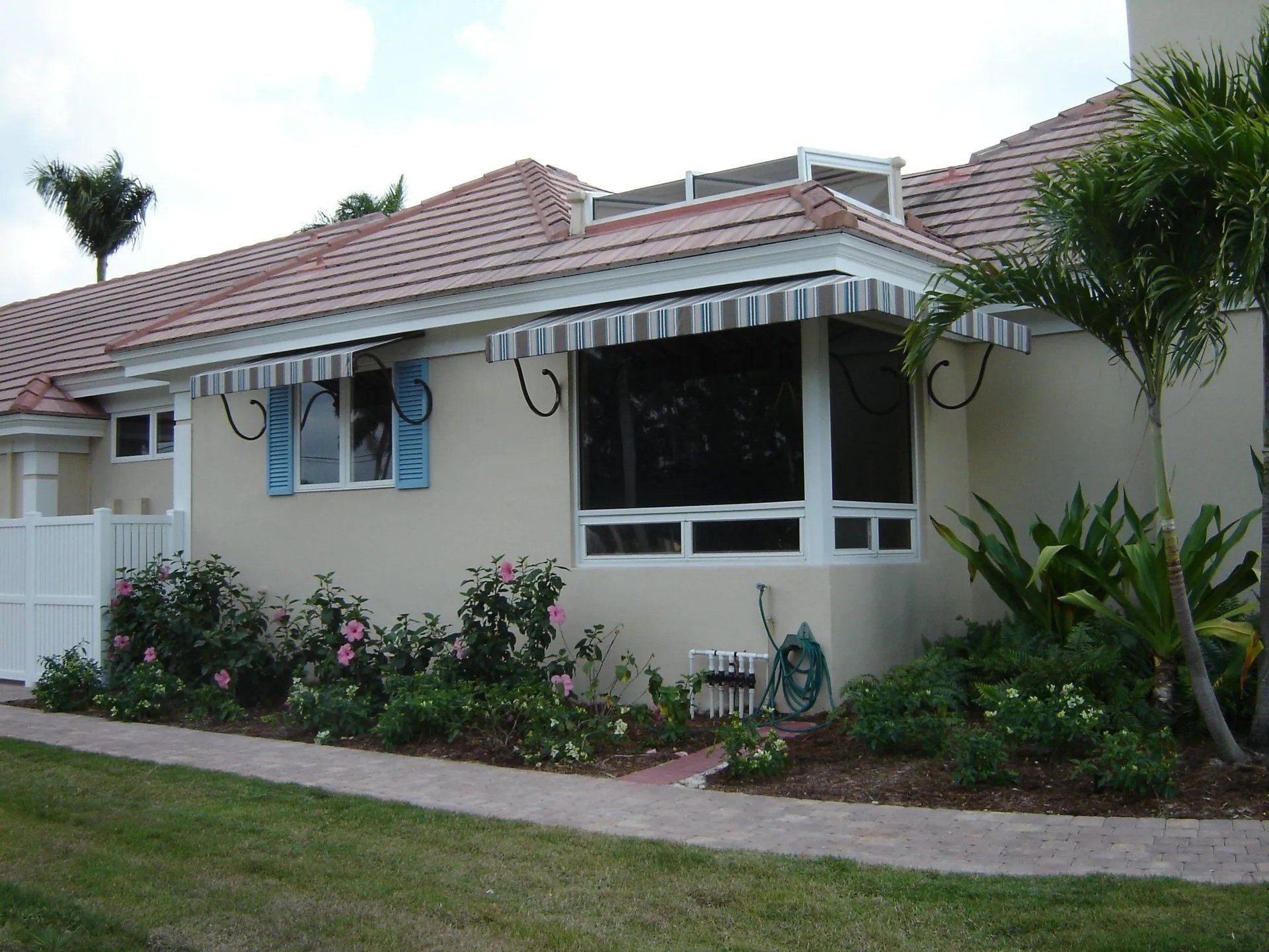 Stripes Awning In Window — Naples, FL — Naples Awning