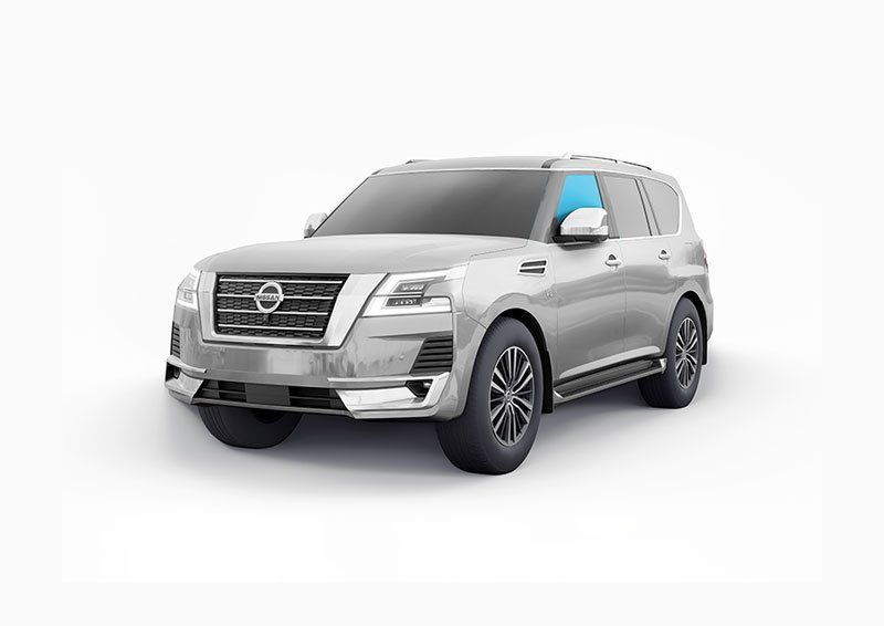 A silver nissan patrol is shown on a white background.