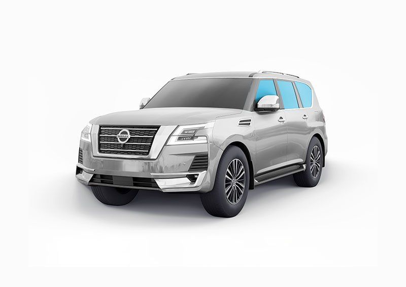 A silver nissan patrol is shown on a white background.