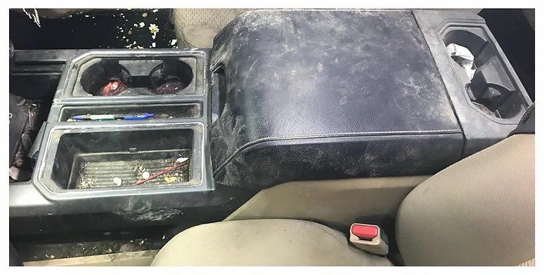 dirty center console before