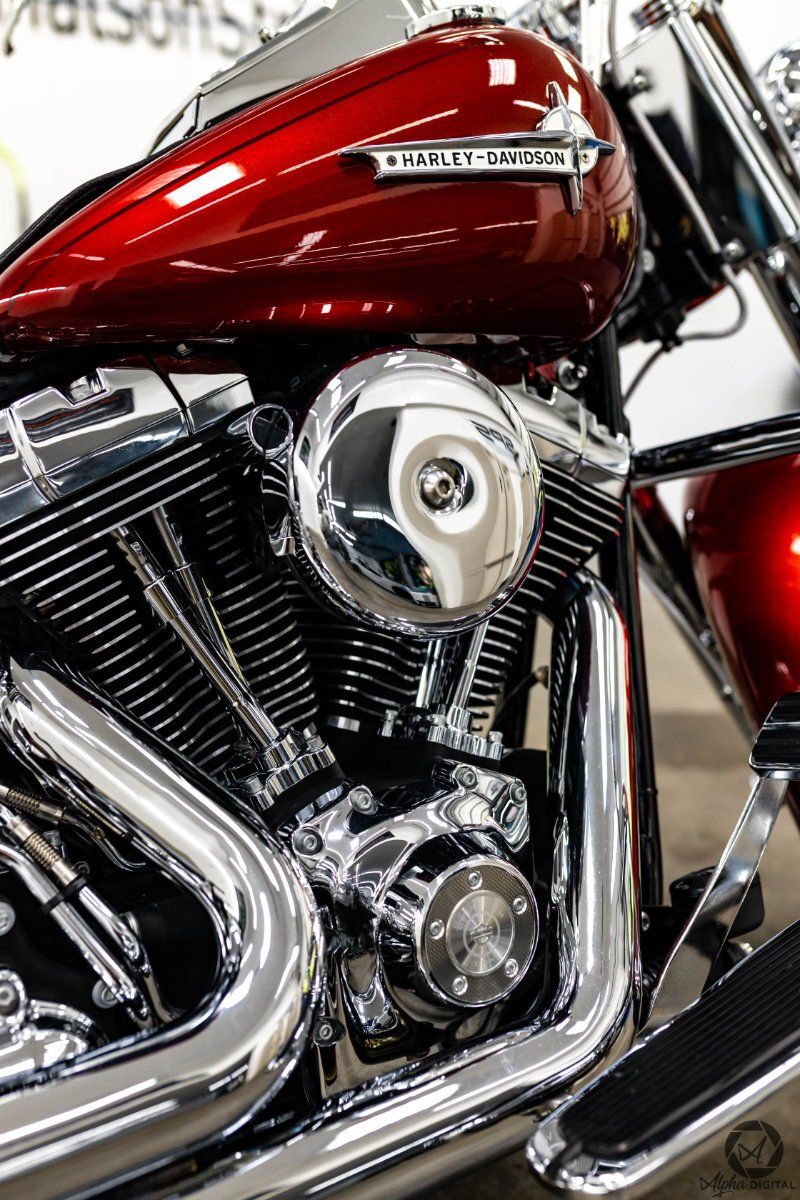 red harley with shiny chrome engine