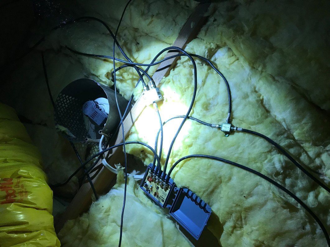 A Bunch of Wires Are Coming Out of a Hole in the Wall — Dylko Electrical in Wauchope, NSW
