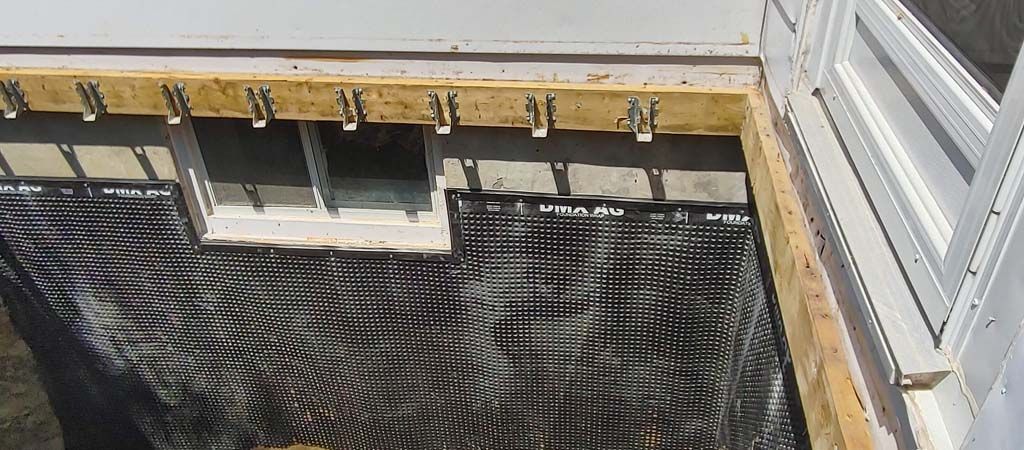 An aerial view of a building under construction with a zebra print floor.