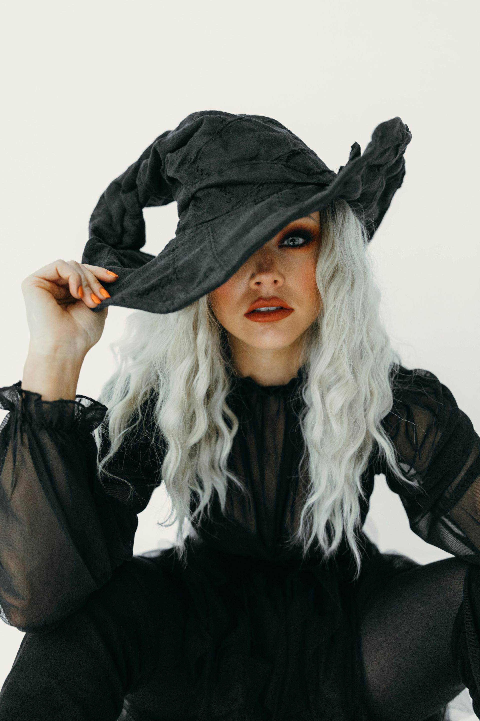woman in witch hat