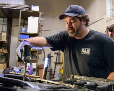 Auto Mechanic Working on Vehicle in Shop | K & N Automotive