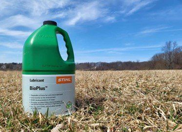 stihl bioplus bar oil in field