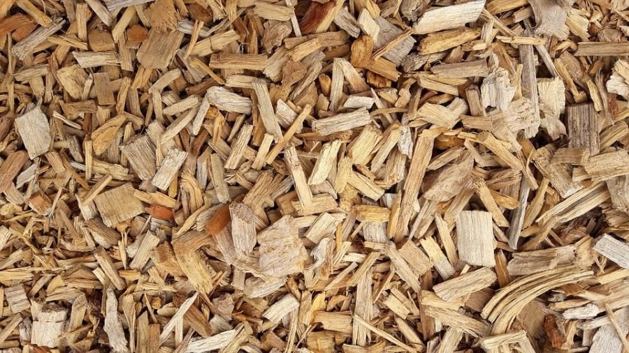 A pile of wood chips sitting on top of each other on a table.