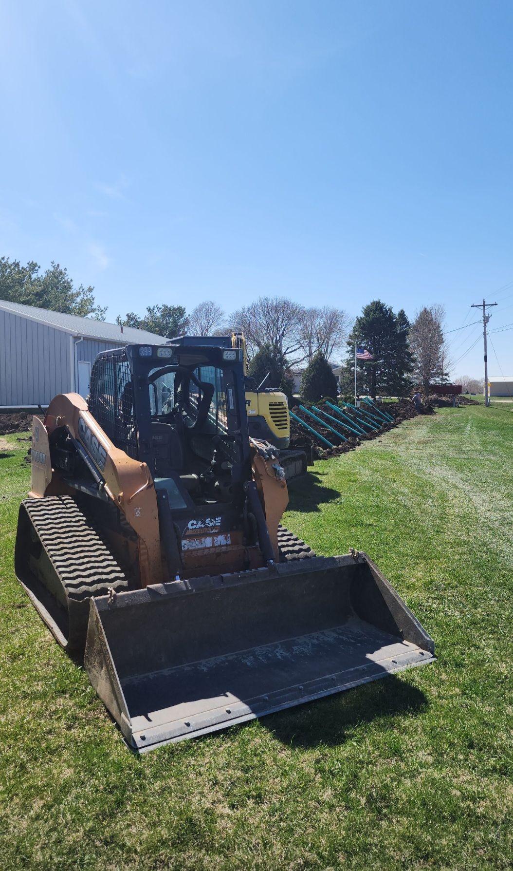 Digging using excavator - Olin, IA - Select Service Pumping