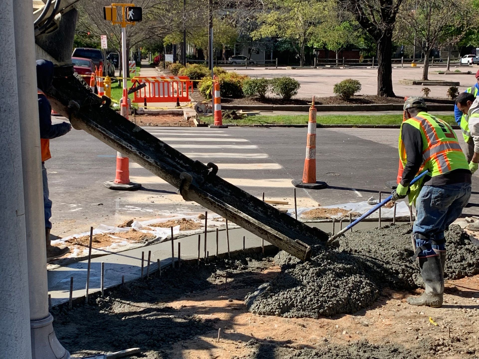 wet concrete being poured around stone in calgary