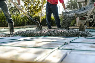 calgary concret pros contractor working on concrete patio job in calgary 