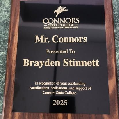 A plaque that says mr. connors presented to brayden stinnett
